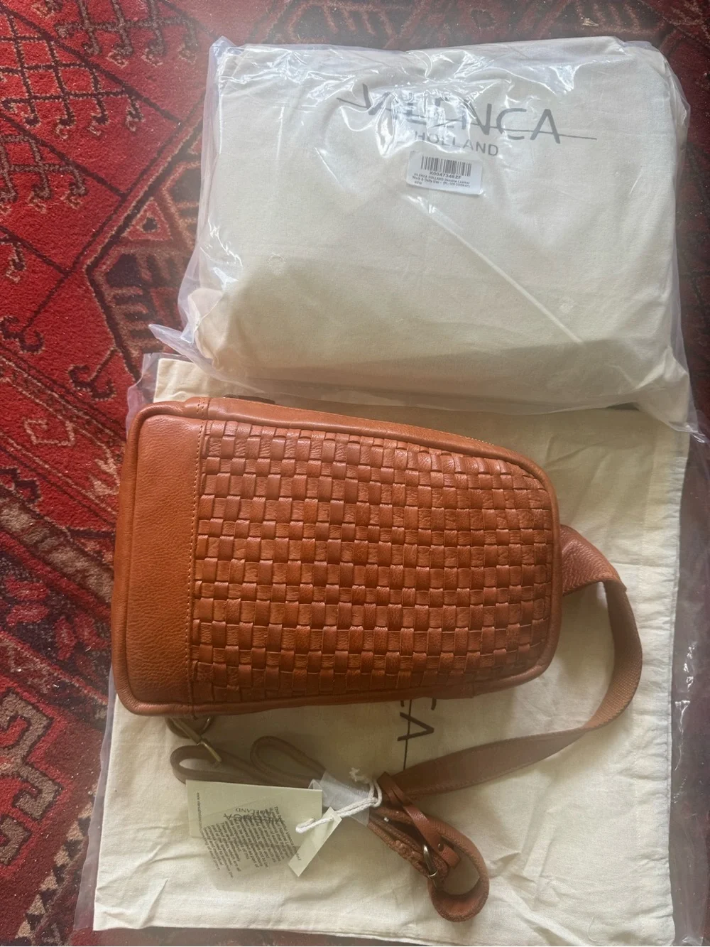 Vilenca Holland Woven Leather Crossbody Bag in Cognac